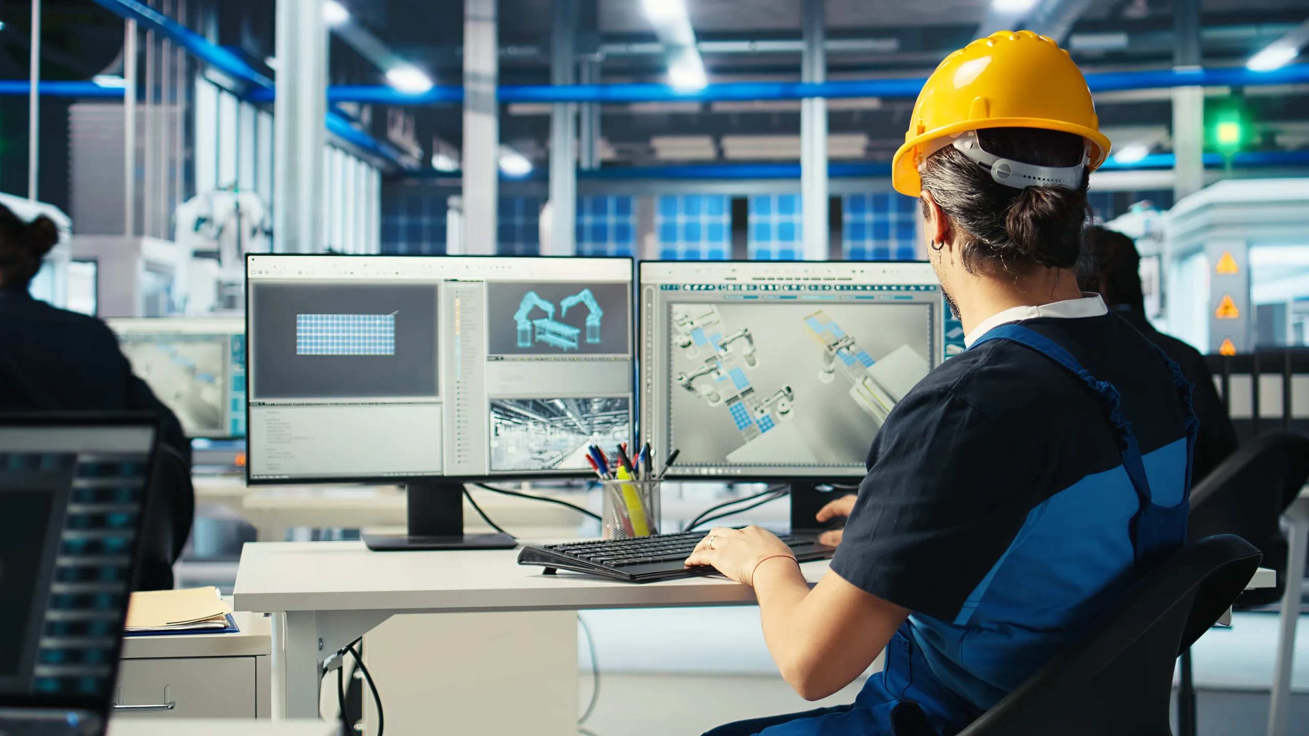 eco-friendly-solar-panels-plant-technician-designing-production-lines-pc-1-scaled.